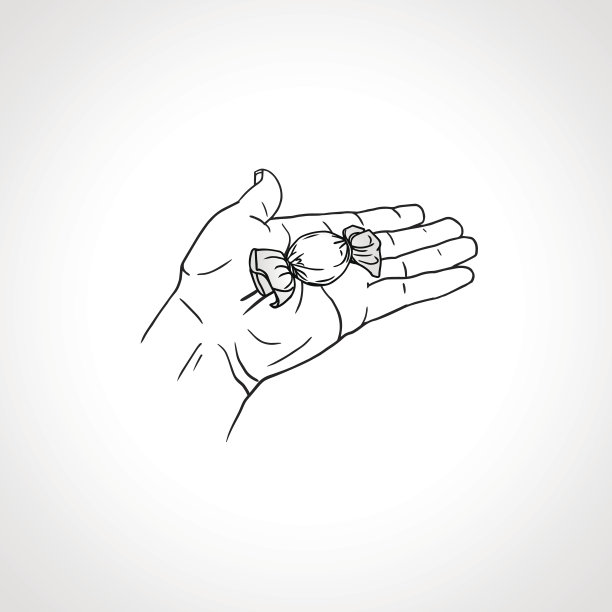 手握巧克力糖果。摊开一只手递上一个包装好的糖果图片下载