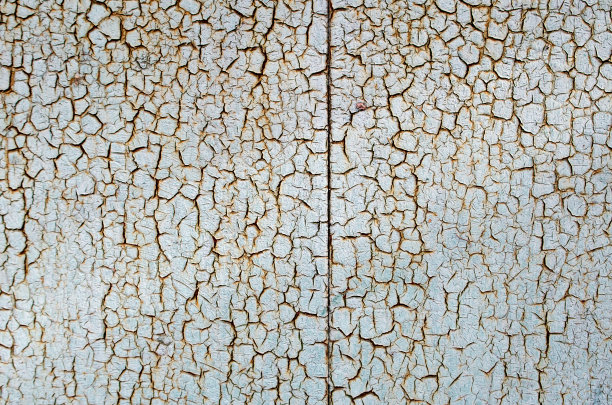 油漆覆盖着生锈的金属表面图片下载