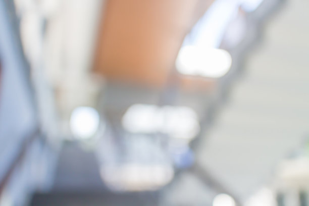 办公室室内大厅楼梯的模糊散景照片。图片下载