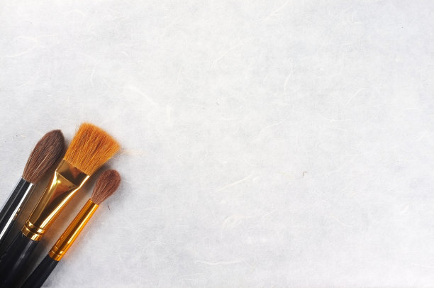 用画笔在宣纸上绘制纹理背景图片下载