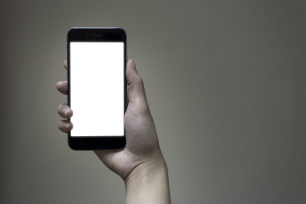 握着黑色iPhone 6的女性图片下载