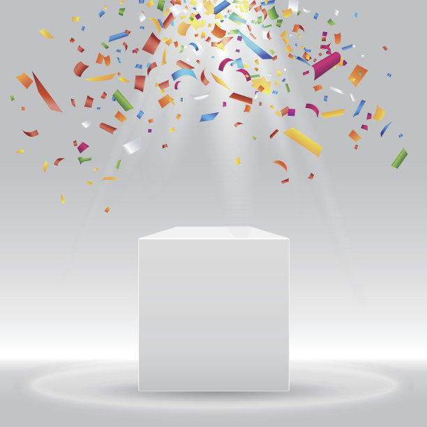 白色的讲台，聚光灯和彩色的纸屑素材图片