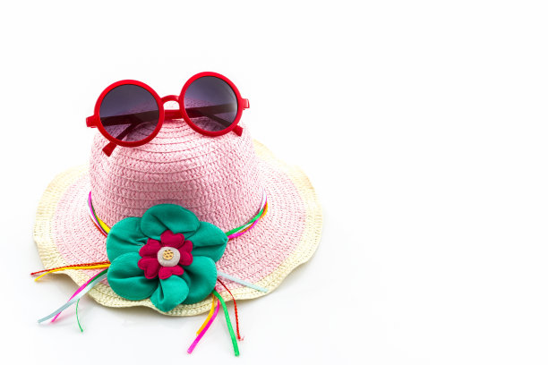 有红色太阳镜的编织帽子。图片下载