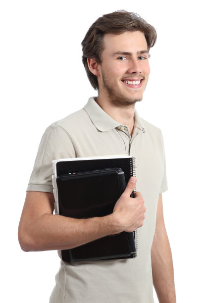 快乐的学生男孩拿着文件夹和电脑图片下载