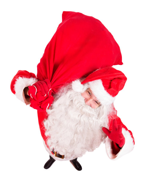 圣诞老人拿着一个袋子，抬头看着镜头图片下载