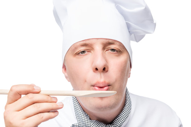 水平特写肖像的厨师与一个木勺图片下载