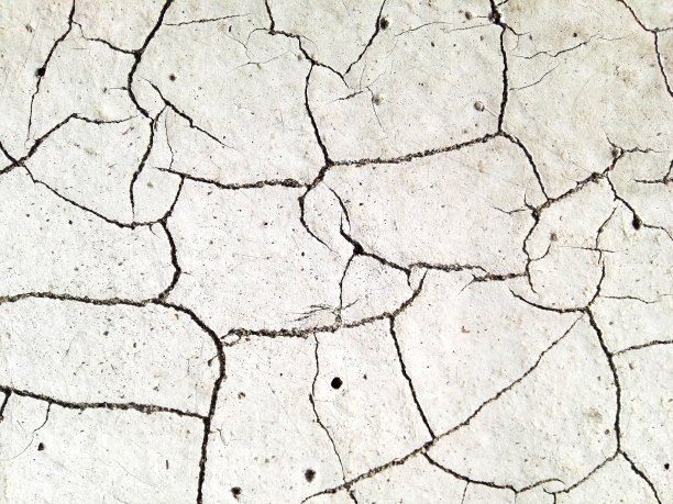 颜色皮肤的道路上有较大的裂缝和纹理图片下载