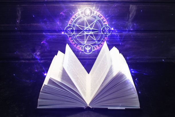 桌上的书发出了光和魔法标志图片下载