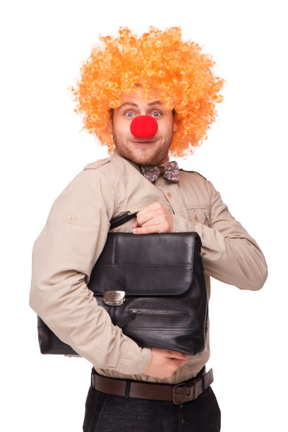 带着小丑假发和鼻子的商人图片下载