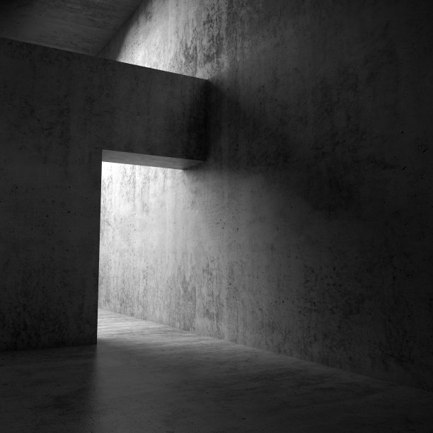 抽象的黑暗空旷的室内，混凝土的门口图片下载