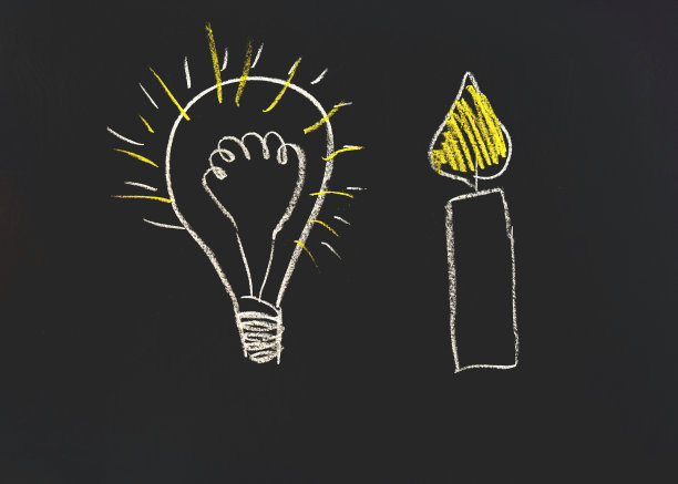 辉光灯和蜡烛。图片下载