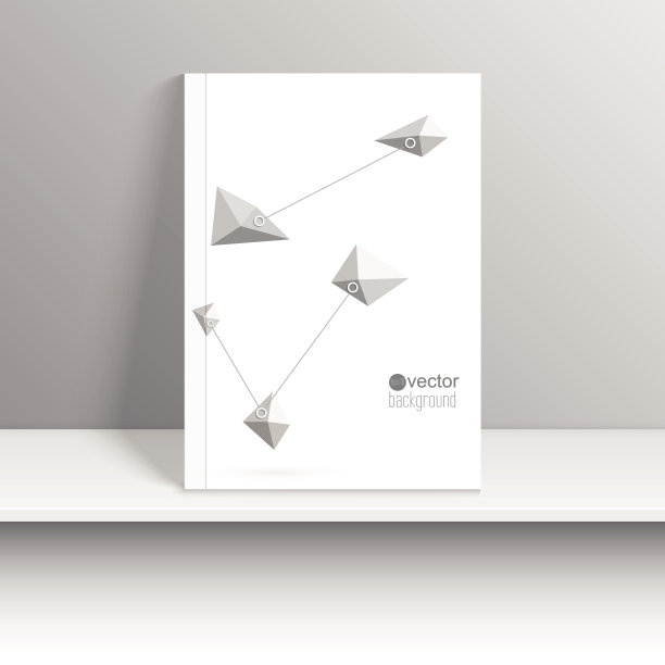 杂志封面放在书架上，有灰色的阴影。图片下载