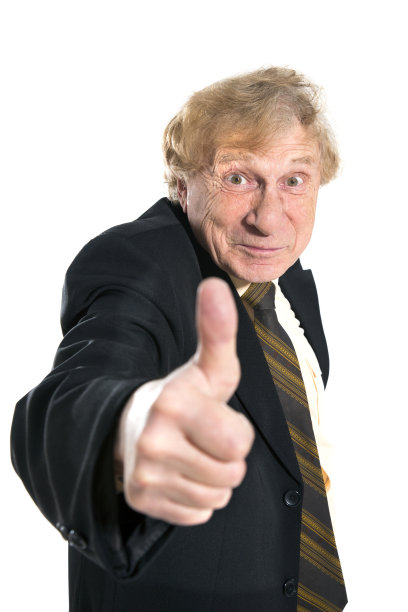 资深商人竖起大拇指图片下载