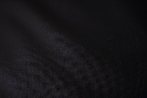 黑色背景纹理的黑色织物布。图片下载