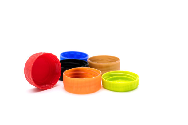 彩色塑料瓶盖孤立在白色背景图片下载
