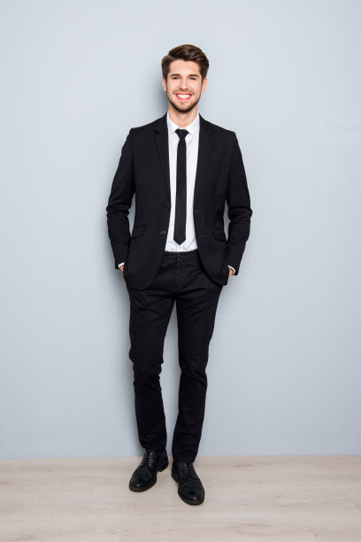 西装革履的成功商人在口袋里牵着手图片下载