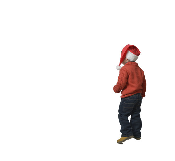 戴着圣诞老人帽，背对着走路的学龄前儿童图片下载