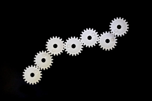 齿轮由白色塑料制成图片下载