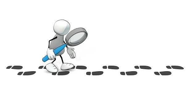 一个拿着放大镜的小个子男人在追踪脚印图片下载