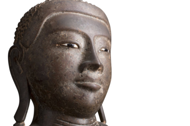 一尊缅甸风格的古铜色佛像。图片下载