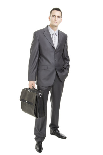 一个年轻商人站立的全身像图片下载