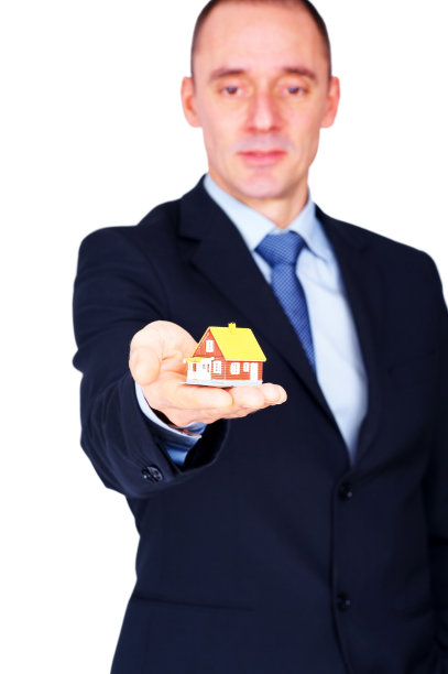 商人手里拿着房子模型图片下载