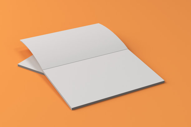 两个空白的白色打开的宣传册模型上的橙色背景图片下载