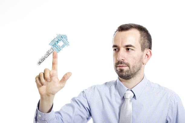 年轻商人触碰“房产”字云图片下载