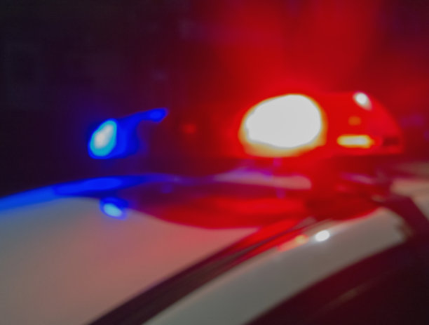 夜间警车红蓝灯光抽象模糊图像图片下载