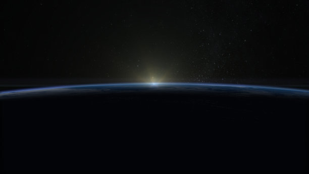 地球上的日出。现实的气氛。体积云。从空间。星空。图片下载