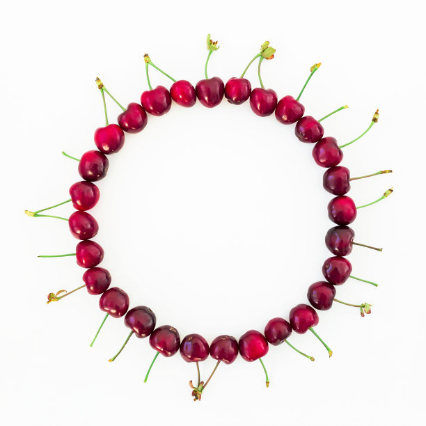 食物框架美味的红樱桃在白色的背景。平的。俯视图图片下载