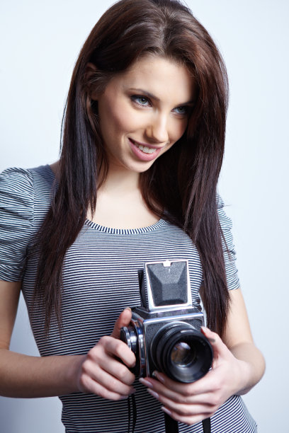 女人用摄影机图片下载