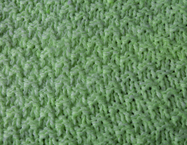 绿色的手工编织的织物图片下载