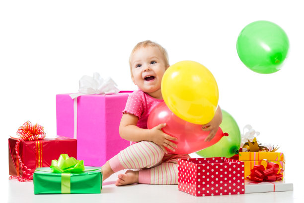 快乐的小女孩与五颜六色的气球和礼物图片下载