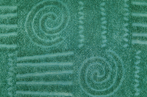绿色背景，毛巾布，几何和螺旋图案图片下载