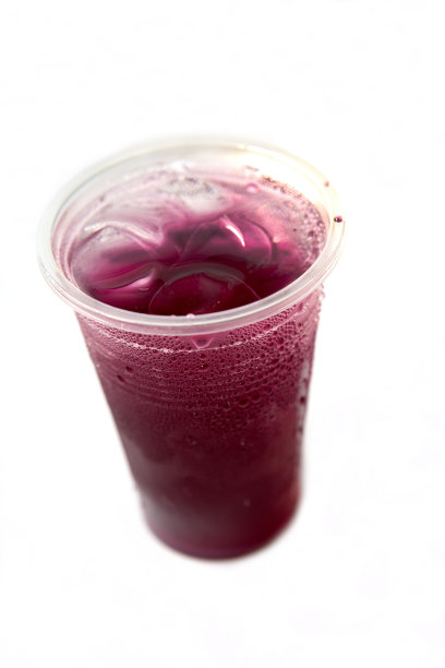 塑料玻璃杯中的甜果汁图片下载