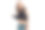 年轻漂亮的黑发女子在黑色t恤看着相机图片下载