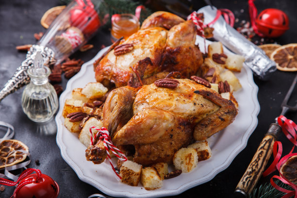 橙子烤鸡。圣诞晚餐图片下载