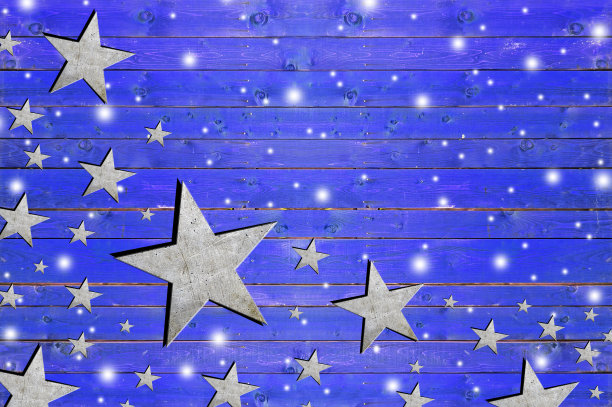 风化的蓝色木头上有很多铁星图片下载