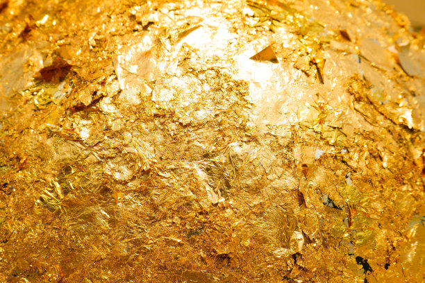 镀金纹理的金质佛像背景，是佛教徒用来祭拜的圣物图片下载