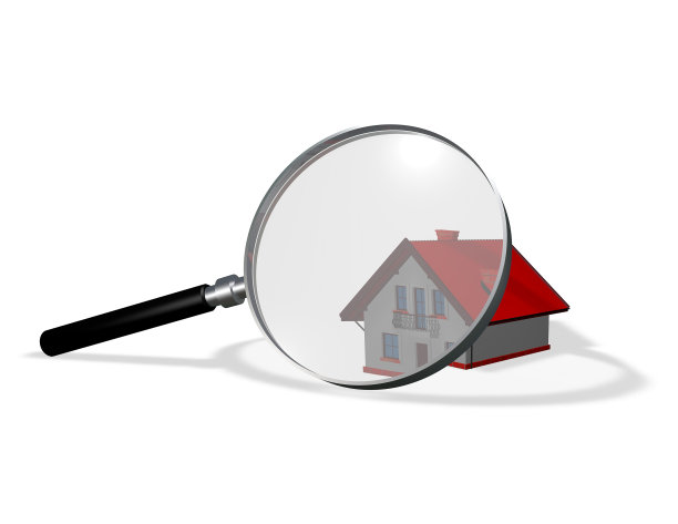 用放大镜放大的3d房子。图片下载