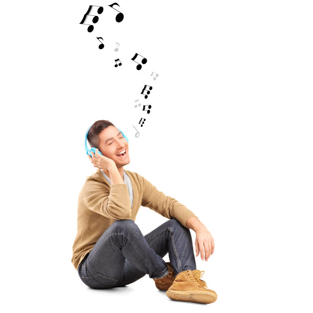 有人在地板上听着周围的音乐和音符图片下载