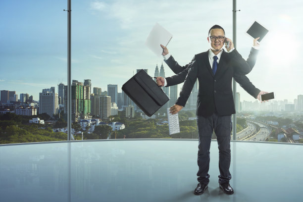 商人有很多的手来完成他的工作，一个强大的商人理念。图片下载