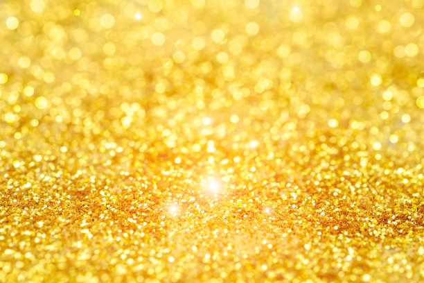 金色抽象背景与模糊柔和的灯光图片下载