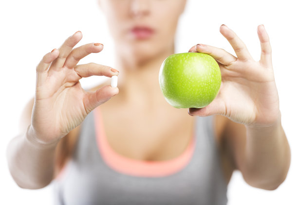 药片/维生素补充剂还是水果?图片下载