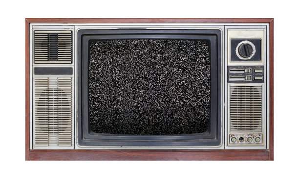 复古电视上的白色背景与图像电视颗粒噪声效应的屏幕。图片下载