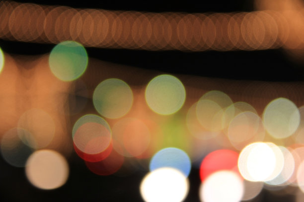 彩色的灯光模糊了散景背景图片下载