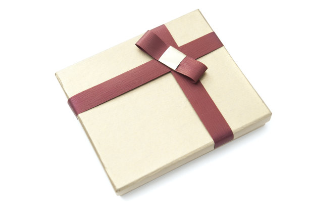 带红色蝴蝶结的金盒子图片下载