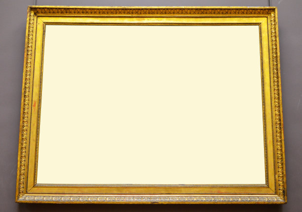 空的金色相框挂在墙上图片下载