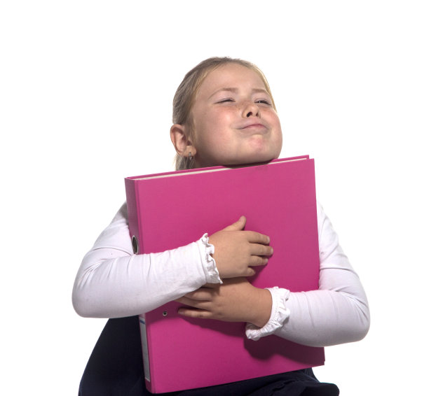 快乐的女学生拿着一本书图片下载